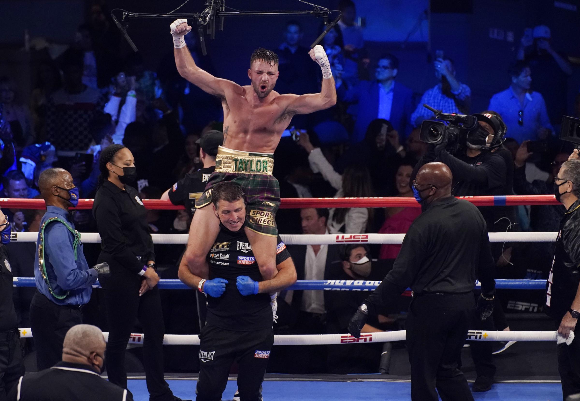 Josh Taylor celebrates after defeating Jose Ramirez by unanimous decision in a junior welterweight title boxing bout Saturday, May 22, 2021, in Las Vegas. (AP Photo/John Locher).