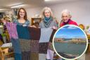 A group of knitters from North Berwick are attempting to 'fix' the damage to the town's harbour wall by knitting a banner to cover it. Image: Gordon Bell