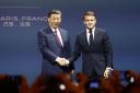 French President Emmanuel Macron and Chinese President Xi Jinping (Mohammed Badra, Pool via AP)