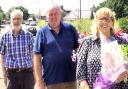 From left: Ian, Dougie, and Maureen following a presentation of tokens of appreciation with a bouquet of flowers on behalf of Macmerry and Gladsmuir Community Council