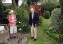 George and Jane Burnet at the pink rowan tree they have planted in the garden of their Inveresk home to mark the Queen’s Platinum Jubilee, as part of the Queen’s Green Canopy tree-planting initiative