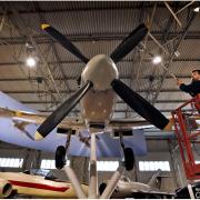 Conservator Joe Jackson spring cleans the National Museum of Flight’s 1945 Supermarine Spitfire ahead of the resumption of seven day-opening. Image: Paul Dodds