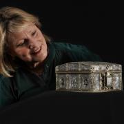 Dr Anna Groundwater, principal curator at National Museums Scotland, with the silver casket believed to have belonged to Mary, Queen of Scots. Picture: Stewart Attwood