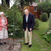 George and Jane Burnet at the pink rowan tree they have planted in the garden of their Inveresk home to mark the Queen’s Platinum Jubilee, as part of the Queen’s Green Canopy tree-planting initiative