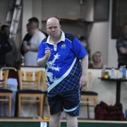 Billy Mellors, seen here playing for Scotland last year, made a winning start at the World Indoor Bowling Championships