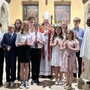 Children confirmed at Our Lady Star of the Sea, North Berwick, by Archbishop Leo Cushley, holding his crozier, symbolising the Good Shepherd. Also pictured is the Rev Father Clement Ajongba, of Our Lady Star of the Sea.