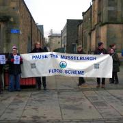 Protestors against the proposed Musselburgh flood defences were in Haddington for the First Minister's visit last Monday. Image: John Blower