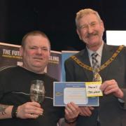 Craig Ogilvie (left) celebrates his success alongside the Chairman of East Riding of Yorkshire Council, Councillor John Whittle. Image: Sea Angling Adventures