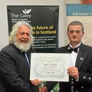Angus Campbell (right) has received a top award from the Royal Caledonian Horticultural Society
