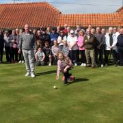 Lexie Blance, 10, threw the first jack at Longniddry Bowling Club on Saturday with grandad Gary Findlay and club members watching on
