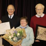 Dr Michael Thomson (left), his wife Brenda and committee member Bill Nimmo at the map presentation ceremony on the occasion of Dr Thomson's retiral as Gullane and Dirleston History Society chairman