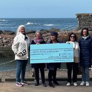 Representatives of North Berwick Drama Circle hand over a cheque to Jane McMinn, chair of the town's harbour trust