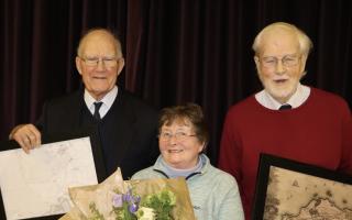 Dr Michael Thomson (left), his wife Brenda and committee member Bill Nimmo at the map presentation ceremony on the occasion of Dr Thomson's retiral as Gullane and Dirleston History Society chairman