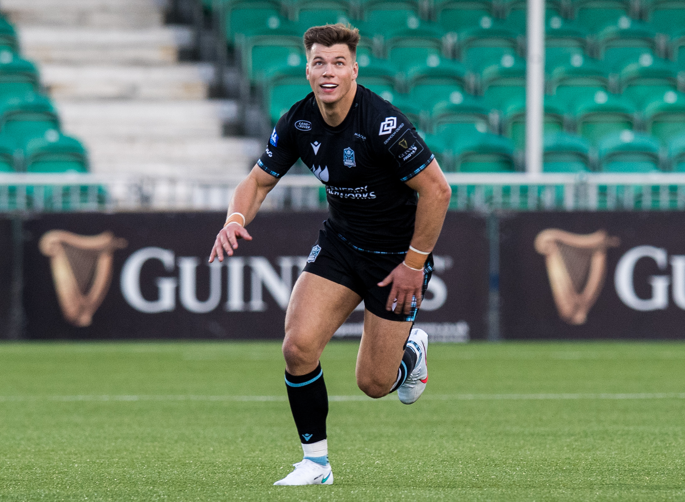 GLASGOW, SCOTLAND - OCTOBER 11: Huw Jones in action for Glasgow Warriors during the Guinness Pro14 match between Glasgow Warriors and Scarlets at Scotstoun Stadium, on October 11, 2020, in Glasgow, Scotland (Photo by Ross Parker / SNS Group).