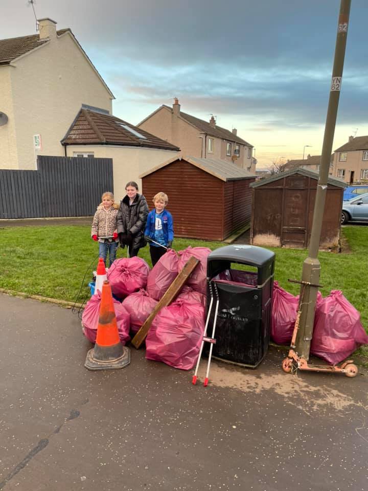 Some of the Windygoul Wombles members taking part in a litter pick and the end of last year