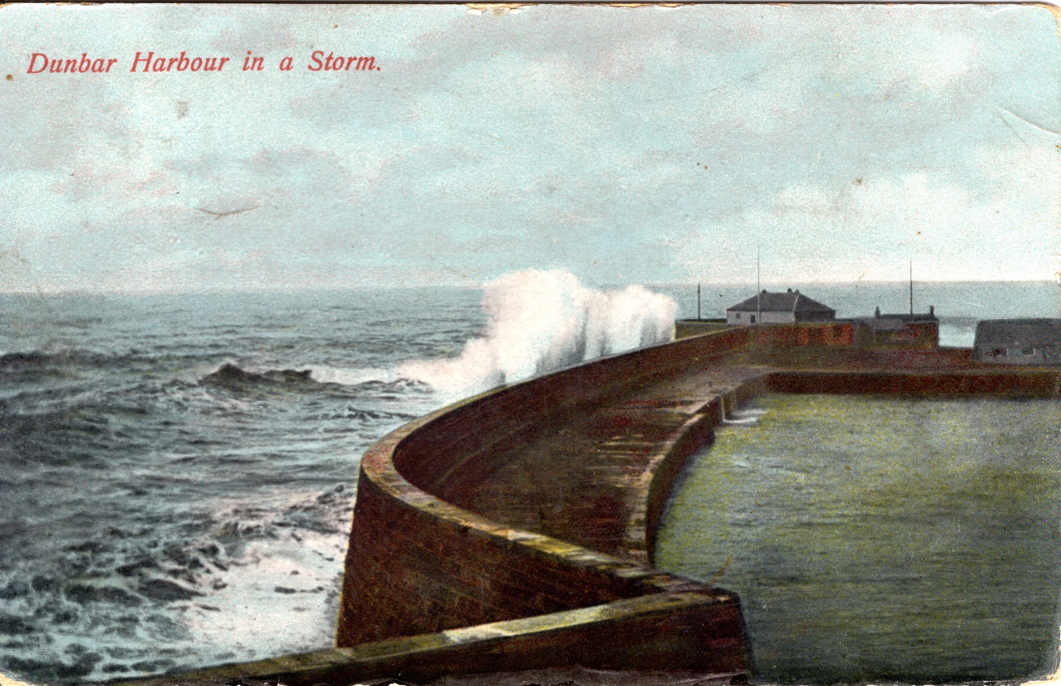 Dunbar harbour in a storm, a postcard stamped and posted in 1907