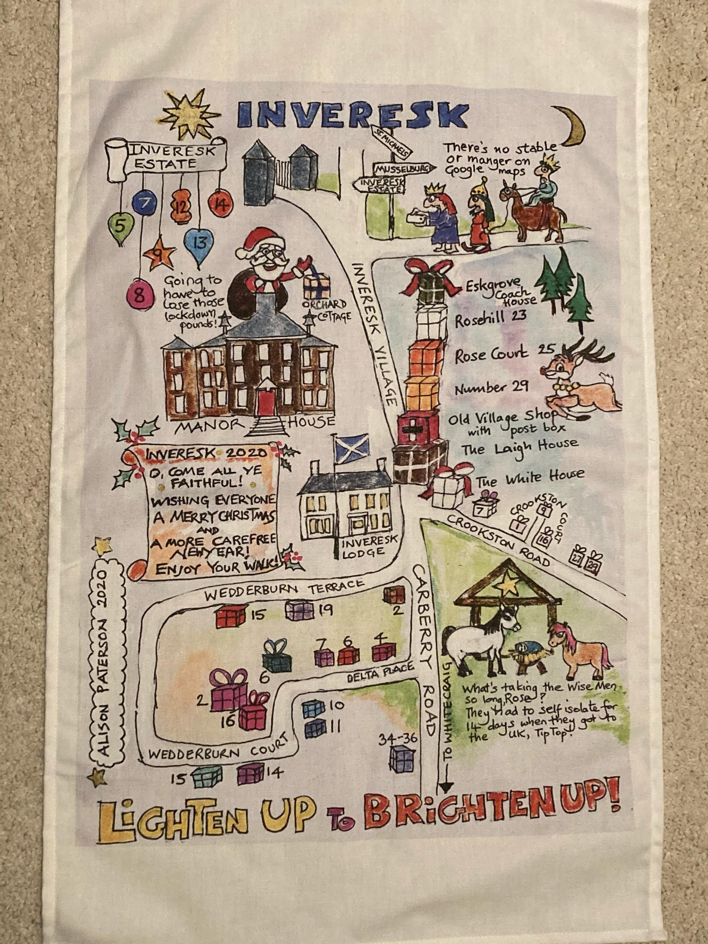 A tea towel showing local artist Alison Patersons work for Lighten Up to Brighten Up Inveresk