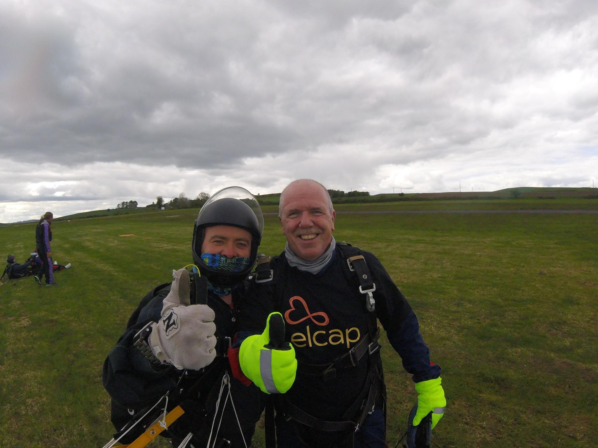 Councillor Andy Forrest, right, gives the skydive the thumbs up and is ready to do it all again