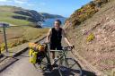 Lachlan Irvine-Hand is cycling the North Coast 500 to help raise money to two internships he is embarking on over the next year