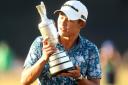 USA's Collin Morikawa holds the Claret Jug Trophy after winning The Open at The Royal St George's Golf Club in Sandwich, Kent. Picture: David Davies/PA