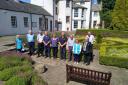 Judges from Keep Scotland Beautiful toured Haddington’s horticultural hotspots last week; they are pictured at St Mary’s Pleasance Garden alongside Blooming Haddington volunteers, council employees and Councillor John McMillan, East