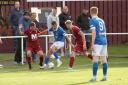 Tranent Juniors (maroon), pictured against Cowdenbeath earlier in the season, fought back for three points against Hearts B