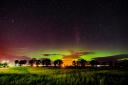 The green lights filled the skies above a field in Kinloss.