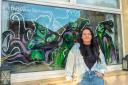Artist Kerrie Buchanan with her Disney villains window artwork at her Wallyford home