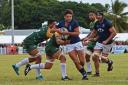Jamie Lauder, in action against the Cook Islands, is aiming to help Hong Kong to the Rugby World Cup