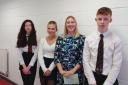 Headteacher Michelle Moore with Matilda Devison,prizewinner for National 5 geography, National 5 biologyand National 5 English; Erin Lennock, prizewinner forNational 5 PE; and Callum Masson, prizewinner for National5 physics, National 5 chemistry and