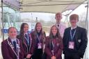Preston Lodge pupils Emmy and Naomi alongside their teammates from Falkirk and Stranraer