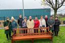 Friends and family gather for the unveiling of Willie Innes' memorial bench