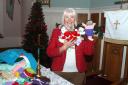 Reverend Janice Andrews, of Musselburgh Congregational Church, with some of the small teddy bears and hand puppets, blankets and home knits made for children in Laos and a children's hospital in the city of Luang Prabang.