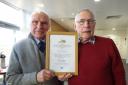 Paul Lambie, right, who campaigned to bring the Old Town Hall and Tolbooth in Musselburgh back into full use, receives a certificate of appreciation from Alister Hadden, chairman of the Musselburgh Museum & Heritage Group
