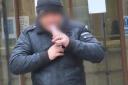 Mark Harkness outside Edinburgh Sheriff Court. We have obscured his face for legal reasons