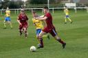 Haddington Athletic (red) in action against Craigroyston
