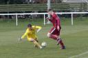 Haddington Athletic (red) in action against Sauchie