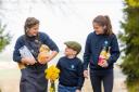 The Calder family children Maisie, Louisa and Charlie, have been getting preparations underway for the farm's Spring Market. Image: Phil Wilkinson Photography