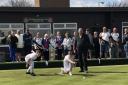 Macmerry Bowling Club is now open for the 2023 season. Club president K Smith watches on as Macmerry Gala Queen Layla and Gala Queen Consort Kai roll the first jacks
