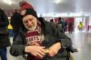 John at Tynecastle with his new hat and scarf enjoying a pie
