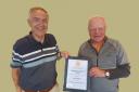 Dave Warren (R) receicing his award for North Berwick Rotary president Lewis Foster