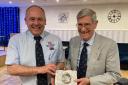 Rod Primrose (R) recently received a long service award from Dunbar Lifeboat Station chairman Mark Lees. Image: Dunbar RNLI