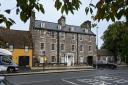 The historic tenement, currently used by Loretto School, has been sold and could be turned into eight flats. Two new houses, with separate access, could also be built at the back of the property