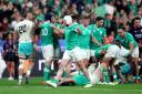Ireland players celebrate victory after the final whistle in the Rugby World Cup 2023, Pool B match at the Stade de France in Paris (Bradley Collyer/PA)