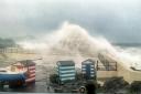 An image of the waves crashing into the harbour area - Image RNLI Twitter/Scottish Seabird Centre