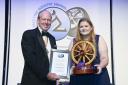 Susannah Tait is celebrating after picking up a prestigious award from Master Wheelwright Nigel Biggs. Image: Tyre Trade News