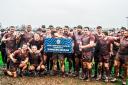 Preston Lodge RFC received the National League Division Three trophy after defeating Dumfries Saints in horrible conditions and are now aiming for cup glory