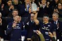 Scotland's Finn Russell (left) and Rory Darge lift the Calcutta Cup after victory in the Guinness Six Nations match at Scottish Gas Murrayfield Stadium on Saturday. Image: Andrew Milligan/PA Wire