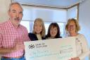 From left, Karl Cleghorn, convenor and a trustee at the Hollies Community Hub, receives a cheque for £1,000 from Carol Edmond, organiser of the Musselburgh Over 50's Club, and Irene Ferrie and Jeanette Ret, also from the club