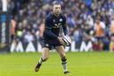 Finn Russell in action for Scotland against France